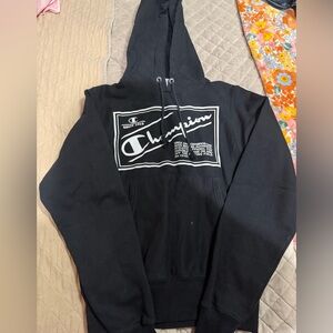 Champion Black Hoodie with Bold White Graphic